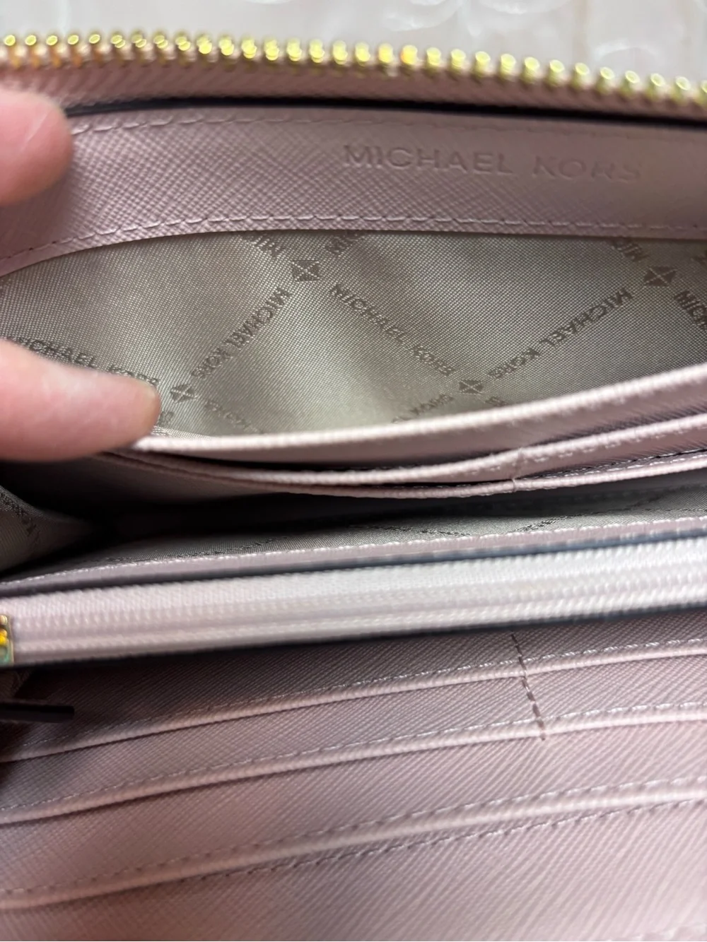 Michael Kors Pale Pink Pebbled Leather Zip-Around Wallet with Gold Logo